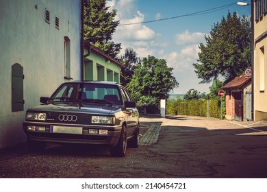 Heubach, Germany - September 18, 2021: Audi Quattro german car parked in a narrow street.