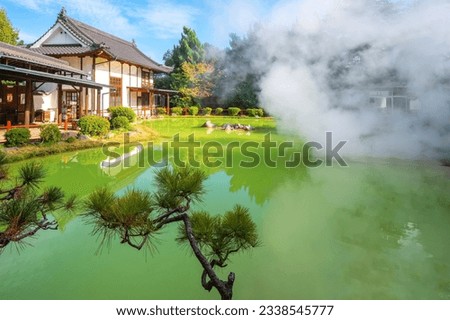 Hewart shape pond at Shiraike Jigoku hot spring in Beppu, Oita. The town is famous for its onsen (hot springs). It has 8 major geothermal hot spots, referred to as the 
