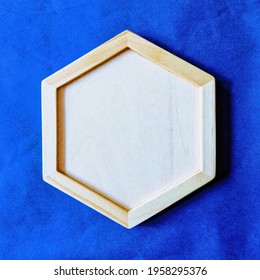 Hexagon Frame Against The Blue Background.