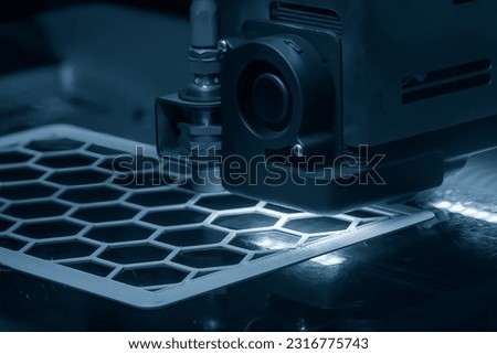 The hexagon shape model made by 3D printer machine. The high technology manufacturing process by rapid prototype method.
