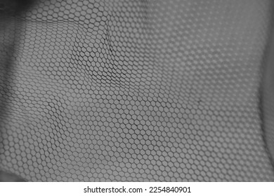 Hexagonal Mesh Waves on a White Background Photo.