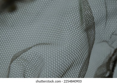 Hexagonal Mesh Waves on a White Background Photo.
