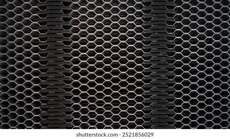 hexagonal metal background of speaker grille 