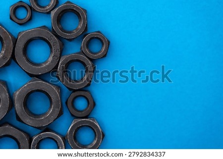 Hexagonal nuts on a blue background