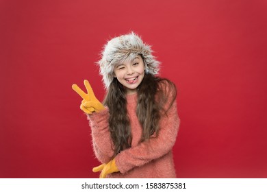 Hey There. Happy Little Girl In Earflap Hat. Holiday Activity Outdoor. Small Child Ready For Winter. Seasonal Health Care. Kid Fashion. Warm Clothes And Accessory Tips. Cold Weather Adventures.