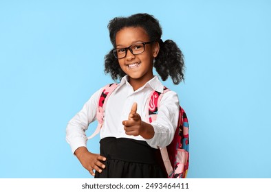 Hey, You. Happy African American Schoolgirl Pointing Finger At Camera Posing In Studio On Yellow Background - Powered by Shutterstock