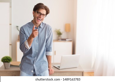 Hey, You. Smiling Man Pointing Finger At Camera Standing Indoors. Free Space For Text - Shutterstock ID 1489163783