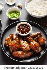 Hhoney-soy Chicken Wings On Plate Over Dark Stone Background. Close Up View