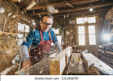 Hhot Of Old Master Carpenter Working In His Woodwork Or Workshop. DETAILS