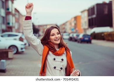 Hi Dear, Greeting Someone. Happy Smiling Woman Waving Hand Waving Over Shoulder Looking Away To A Friend Colleague Mate. 