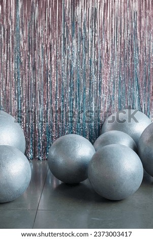 hi tech background, interior with varicoloured wall and big silver balls decoration 