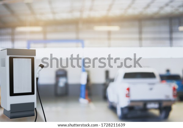 Hi\
tech industry garage EV-car charger recharge refuel electric\
station vehicle transport transportation of\
future