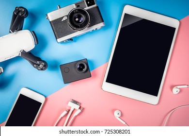 Hi tech Travel gadgets Videography device object with empty digital tablet screen Camera mobile phone, drone, action cam for application mock up and poster, for Technology Toys and Gadget concept. - Shutterstock ID 725308201