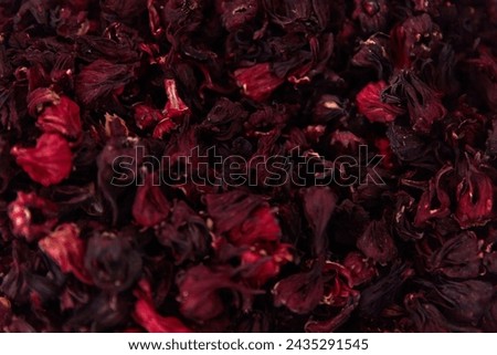 Hibiscus dried flowers texture pattern. Flat lay top veiw karkade tea