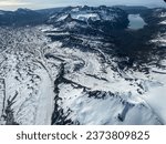 Hickerson Lake at Lake Clark National Park in Alaska. Chinitna Bay in the Cook Inlet, foot of Mount Iliamna. Aerial view of rugged and remote mountains, glaciers, lakes and rivers.