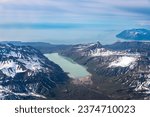 Hickerson Lake at Lake Clark National Park in Alaska. Chinitna Bay in the Cook Inlet. Aerial view of rugged and remote mountains, glaciers, lakes and rivers.
