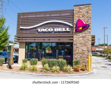 HICKORY, NC, USA-9/2/18: The Front Exterior Of A Taco Bell Restaurant In Hickory, NC, Showing The Drive-thru, And One Pickup Truck Parked To The Left.left Front Window.