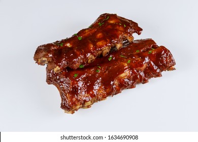Hickory Smoked Barbecue Beef Ribs On Isolated White Background.