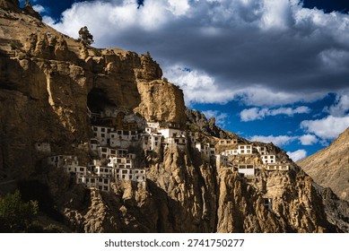 Hidden deep inside the dramatic landscapes of the Zanskar region of Ladakh, Phugtal Monastery is one of the most extraordinary and remote Buddhist monasteries in the world. Built into the mouth of a natural cave high above the Lungnak River, this monastery appears as if it is organically growing out of the cliff itself. Surrounded by barren mountains, rugged trails, and absolute silence, Phugtal Monastery is not just a religious site—it is a living symbol of faith, endurance, and spiritual devotion in one of the harshest inhabited terrains on Earth.