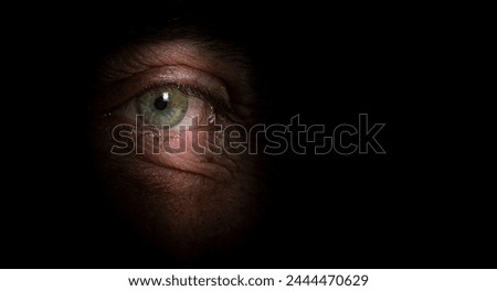 hidden mystery eye spy peeping through crack 