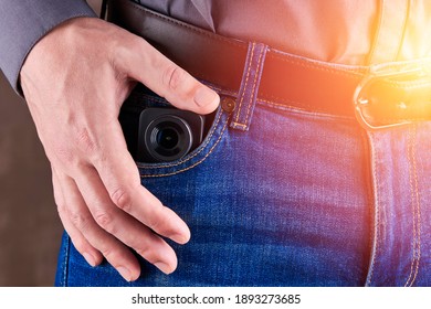 Hidden Photo Or Video Camera At Jeans Pocket. Harassment And Blog Concept.