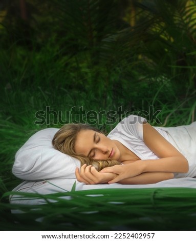 A hidden place. Sleeping woman in deep jungle forest lies on airbed