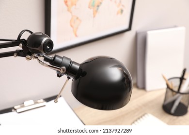 Hidden Spy Camera Attached To Table Lamp Indoors, Closeup