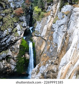 Hidden waterfall in the forest - Shutterstock ID 2269991185