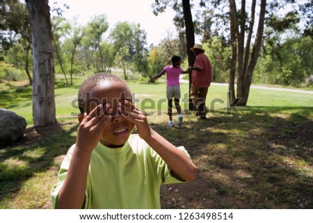 Similar – Image, Stock Photo game of hide-and-seek