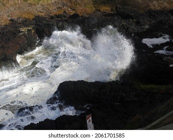 Hide tide waves foam in Devil's Churn, Cape Perpetua, Oregon coast