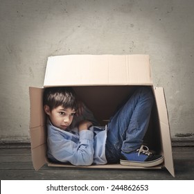 Child hiding in box Images, Stock Photos & Vectors | Shutterstock