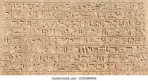 Hieroglyph on walls of Karnak temple 4  - Shutterstock ID 1931489096