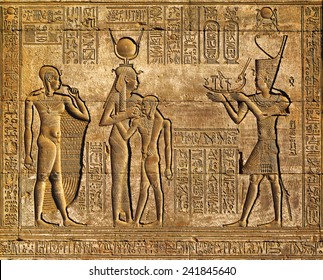 Hieroglyphic carvings on the exterior walls of an ancient egyptian temple  - Shutterstock ID 241845640