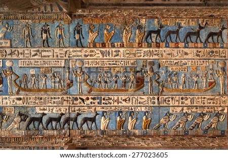Hieroglyphic carvings and paintings on the interior walls of an ancient egyptian temple in Dendera