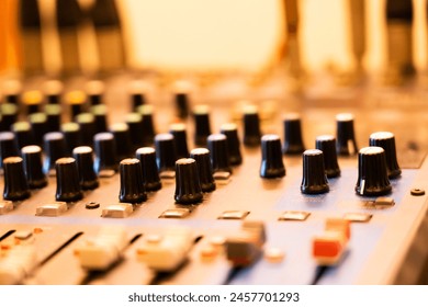 Hi-Fi system console control panel audio equipment Close-up of digital studio mixer control panel Use blurring techniques.