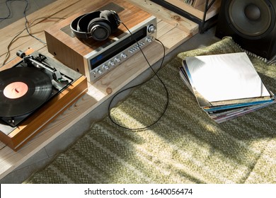 HiFi System With Turntable, Amplifier, Headphones And Lp Vinyl Records In A Listening Room