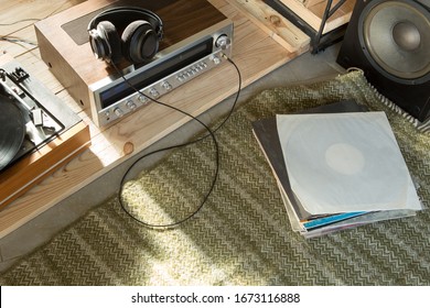 HiFi System With Turntable, Amplifier, Headphones And Lp Vinyl Records In A Listening Room