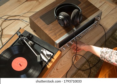 HiFi System With Turntable, Amplifier, Headphones And Lp Vinyl Records In A Listening Room