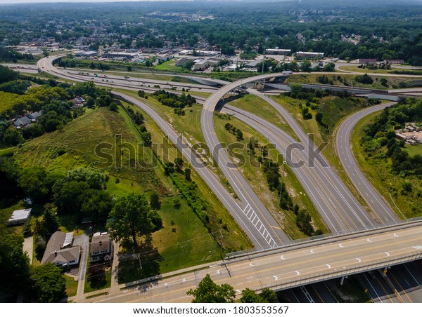 High above highways, interchanges the roads\
band and the interstate takes you on a fast transportation highway\
in Cleveland Ohio US drone\
view