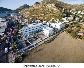 High Aerial Overview Of Carnival Parade On  Philipsburg St.maarten Capital. 