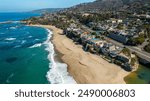 High Altitude Aerial Photo of the Laguna Beach Coastline with Beachfront Homes and Pacific Coast Highway