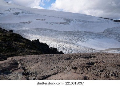 High In The Andes Cordillera. View Of Glacier Alerce In Tronador Hill. View Of The Ice Field And Rocky Mountain.