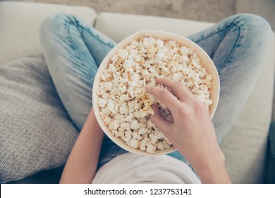 High Angle Above Top View Close Up Overhead Pow First Person Cropped Photo Of Spectator Lady With Her Bucket Of Corn She Sit Indoor Cozy Fancy Bright Flat Look Video