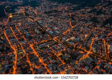 High Angle Aerial Drone Night Shot Of City Street Lights In Lugano, Switzerland