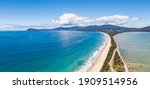 High angle aerial drone view of the Neck, an isthmus of land connecting north and south Bruny Island in southern Tasmania, Australia that offers 360 degree views and is a famous tourist destination.