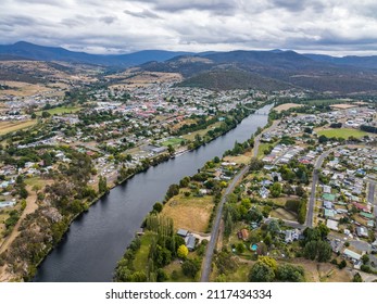 High Angle Aerial Drone View Of River Derwent, One Of The Major Rivers On The Island Of Tasmania, Australia, Near The Town Of New Norfolk, 30 Kilometres From Tasmanias Capital City Hobart.	
