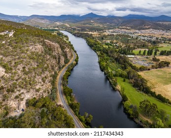 High Angle Aerial Drone View Of River Derwent, One Of The Major Rivers On The Island Of Tasmania, Australia, Near The Town Of New Norfolk, 30 Kilometres From Tasmanias Capital City Hobart.	
