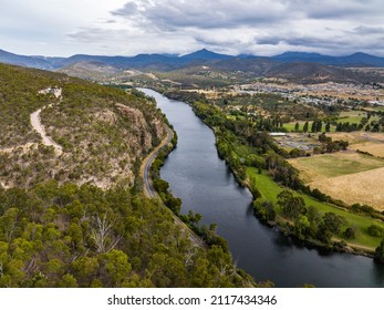 High Angle Aerial Drone View Of River Derwent, One Of The Major Rivers On The Island Of Tasmania, Australia, Near The Town Of New Norfolk, 30 Kilometres From Tasmanias Capital City Hobart.	
