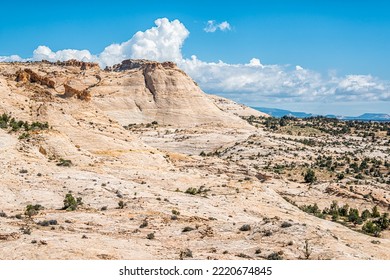 High angle aerial view of colorful sandstone formations landscape in Grand Staircase Escalante National Monument in Utah from highway 12 scenic byway