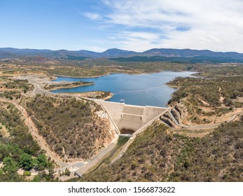 High Angle Aerial View Of Cotter Dam And Cotter Reservoir, A Supply Source Of Potable Water For The City Of Canberra In The Australian Capital Territory, Australia. Low Water Levels Due To Drought.